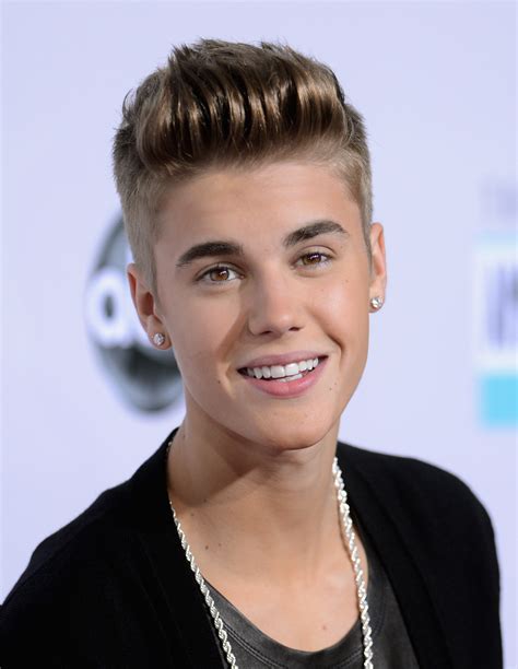 JUSTIN BIEBER .